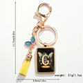 Detailed size specifications for butterfly letter G keychain with tassel and lobster clasp - Letter G