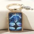 Detail of a rectangular tree of life keychain with blue cosmic pattern and gold frame - Ice Blue Tree(3)