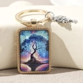 Close-up of Life Tree glass keychain with gold metal frame and silver tree charm - Dreamy Pink Purple Tree(4)