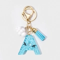 Detail of resin letter A keychain with blue sky clouds pattern and blue tassel charm - Letter A Style (A)