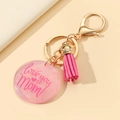 Roze acryl Love You Mom sleutelhanger met bijpassende kwast en gouden metalen ring - Roze