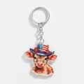 Detail of acrylic Highland cow keychain with Independence Day hat and floral accents - Wearing Flag Top Hat Style (9)