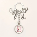 Detailed medical keychain with syringe, stethoscope charms and floral letter B pendant - Letter B / 9.5CM