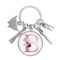 Dettaglio portachiavi dentista con spazzolino, dentifricio, dente e lettera B rosa - Motivo Alfabeto B (B)