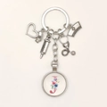 Detail view of silver medical keychain with stethoscope, syringe and floral letter J - Letter J / 9.5CM