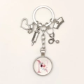 Detailed nurse keychain with syringe stethoscope and floral letter N glass pendant - Letter N / 9.5CM