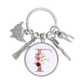Détail du porte-clés dentaire créatif avec lettre F fleurie et petits charms - Motif Alphabet F (F)