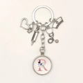 Nurse keychain featuring medical charms, stethoscope, syringe, and floral letter R pendant - Letter R / 9.5CM