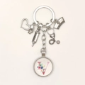 Detailed silver nurse keychain with floral pink letter V and medical charms decor - Letter V / 9.5CM