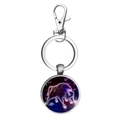 Detail of Taurus zodiac glass gem pendant on silver metal keychain for gifts - Taurus