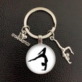 Detail of silver gymnastics keychain with silhouette pendant and I Love Gymnastics charm - White Background (13)