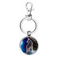 Detailed view of silver metal keychain with Capricorn zodiac artwork in glass pendant - Capricorn
