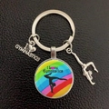 Rainbow Gymnastics glass pendant keychain with silver heart charm on black leather background - Rainbow Arch (9)