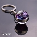 Scorpio zodiac keychain featuring a double-sided purple galaxy glass ball and silver ring - Scorpio (1)