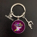 Close-up of gymnastics keychain with silver metal charms and purple I Love Gymnastics logo - Purple Rainbow (8)