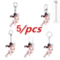 5pcs set of cute 2D acrylic tennis girl keychains with various metal clasps for backpacks - Set
