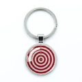 Close-up of a silver alloy dartboard keychain with red and white target design - Red White Target (8)