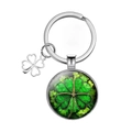 Macro detail of silver four-leaf clover keychain with green glass cabochon gem charm - Dark Green Vintage Style (5)