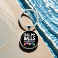 Detail of bingo keychain with glass dome and PULL MY BALLS text on stone pool background - Pull My Balls And Make Me Yell Bingo(14)