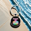 Detail of silver bingo ball keychain with colorful graphics on a summer water background - Shake Those Bingo Balls(16)