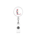 Close-up of retractable badge reel featuring a floral letter L design on a white surface - Letter L