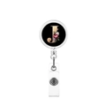 Macro detail of retractable badge reel featuring a floral letter J on a black base - Letter J