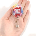 Porte-badge rétractable en acrylique avec design de sac de sang et motifs floraux - Type O Poche de Sang Floral