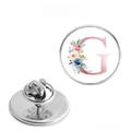 Detailed front and back view of a stainless steel floral G alphabet pin with butterfly clutch - Letter G