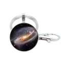 Detailed close-up of a cosmic nebula keychain with silver metal frame and lobster clasp - Milky Way