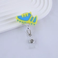 Detail of retractable badge holder with blue and yellow football cleat charm - Sneaker Style (2)