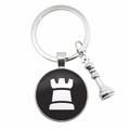 Close-up of metal chess keychain with silver king charm and rook pattern pendant - Rook Style (12)