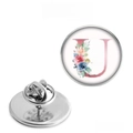 Close-up of a silver stainless steel brooch featuring a floral letter U design and back pin - Letter U