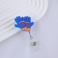 Detail of blue and orange retractable glove-shaped badge holder on white wavy tray - Sports Glove (5)