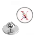 Detail view of round floral letter X brooch with silver butterfly pin backing - Letter X