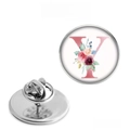 Detailed view of silver metal round brooch with pink floral letter Y and butterfly clutch - Letter Y