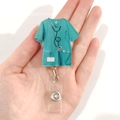 Retractable teal nurse uniform badge reel with medical tools graphic on acrylic - Medical Theme (9) / Turquoise Green