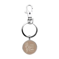 Detail of silver inspirational glass dome keychain with 1 Corinthians 16:14 bible verse - 1 Corinthians 16:14 Light Brown Background Floral Style