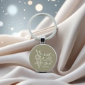 Detail view of Psalm 46:10 bible verse keychain with floral motif on satin fabric - Psalm 46:10(6)
