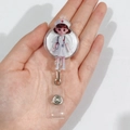 Retractable acrylic ID badge holder featuring a cute cartoon nurse with a red cross icon - Red Cross Transparent Nurse (8)