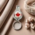 Silver stainless steel nail clipper keychain with red Canada maple leaf flag design - Style 2