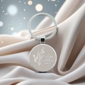 Detail of Bible verse keychain with Be Strong and Courageous text on silk background - Joshua 1:9(8)