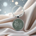 Bible verse keychain with floral illustration on emerald green glass cabochon - Romans 12:12(10)