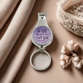 Detailed macro view of silver nail clipper with Bible verse Psalm 46:10 and keychain - Purple Cloud Bible Quote Style(5)