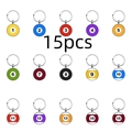 Matrix display of fifteen different billiard ball keychains with metallic edges - Full Series Number Style