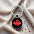 Silver keyring with Canada maple leaf pendant on elegant champagne satin background - Black Background Red Leaf Style (1)