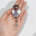 Retractable acrylic badge holder featuring a cute cartoon male doctor design with clip - Male Doctor with Glasses and White Coat (15)
