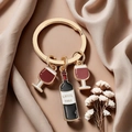 Golden keychain with Lafite wine bottle and wine glass charms on satin background - Wine Glass Bottle Pendant (Gold)