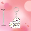 Detail view showing the 0.25cm thickness of this heart-shaped acrylic religious keychain - Juan 3:16 White Polka Dot Style (11)