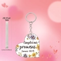 Detail view of heart-shaped acrylic charm with floral print and Spanish verse - Genesis 28:15 Purple Yellow Floral (8)