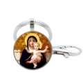 Close-up of Madonna and Child religious pendant keychain with silver metal clip - Madonna and Child (3)